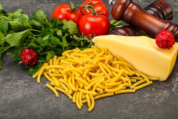 Italian pasta raw Maccheroni for cooking