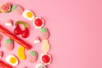 Fototapeta na wymiar candy, sugar on pink background