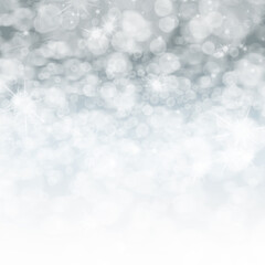 Silver Christmas or New Year eve background with bokeh and copy space. Abstract holiday backdrop.