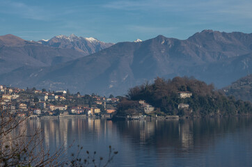 Fototapeta na wymiar Winter view of Ossuccio and Isola Comacina.Como lake, lombardy, Italy