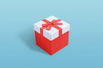 Red Christmas gift box on blue background