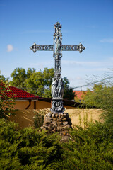 Obraz premium religious cross at the edge of the village