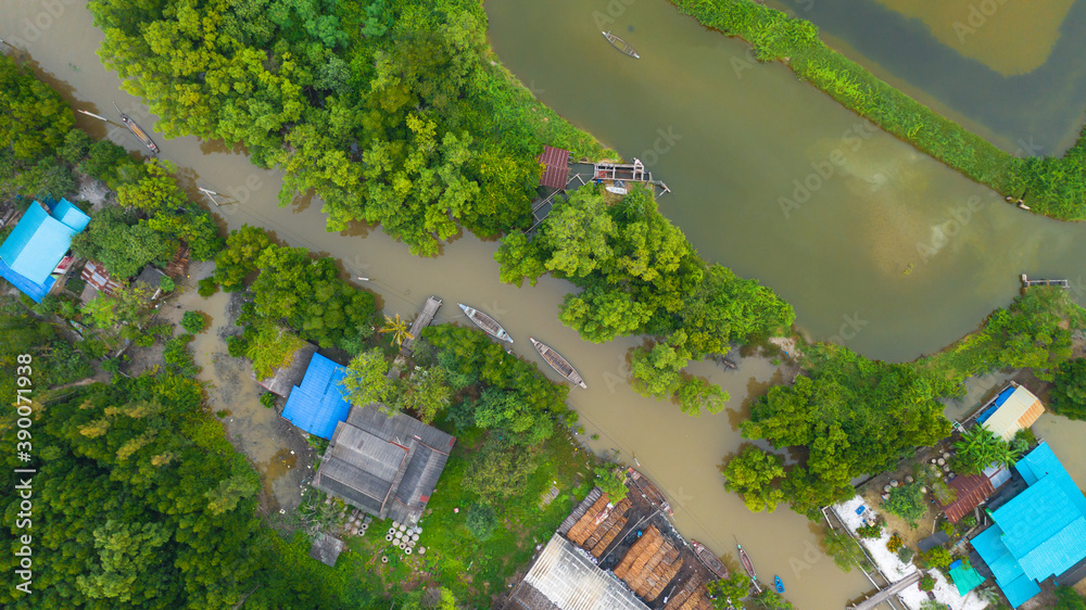 Wall mural Aerial view fisherman boat in the countryside thailand