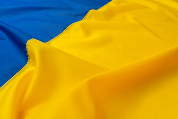 Fototapeta na wymiar Photo of Rippled national flag of Ukraine