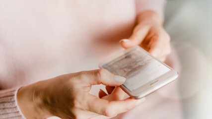 Woman using her mobile phone