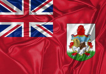 Bermuda flag waving in the wind. National flag on satin cloth surface texture. Background for...