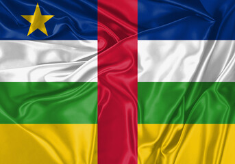 Obraz premium Central African Republic flag waving in the wind. National flag on satin cloth surface texture. Background for international concept.