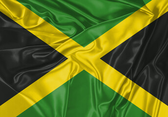 Jamaica flag waving in the wind. National flag on satin cloth surface texture. Background for international concept.