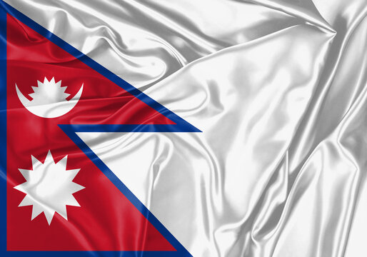 Nepal flag waving in the wind. National flag on satin cloth surface texture. Background for international concept.