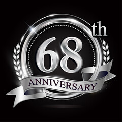 Celebrating 68th anniversary logo, with silver ring and ribbon.