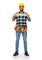 profession, construction and building - happy smiling male worker or builder in helmet with level over white background