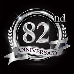 Celebrating 82nd anniversary logo, with silver ring and ribbon.