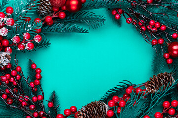 Fototapeta na wymiar Christmas decorations on the blue background with copy space for your text.