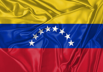 Venezuela flag waving in the wind. National flag on satin cloth surface texture. Background for international concept.