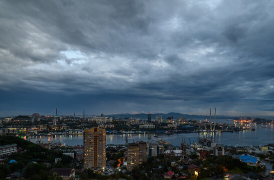 Cityscape with dark moody sky.