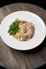 Pasta fettuccine with mushrooms and chicken