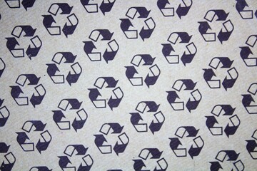 evocative texture image of recyclable logo