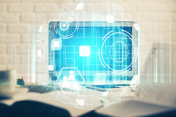 Computer on desktop with social network hologram. Multi exposure. Concept of international people connections.
