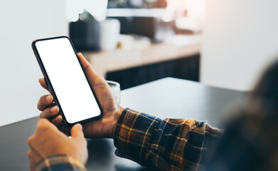 cell phone blank white screen mockup.woman hand holding texting using mobile on desk at office.background empty space for advertise.work people contact marketing business,technology