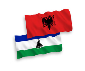 Flags of Lesotho and Albania on a white background
