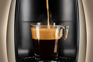 coffee maker filling a glass cup of coffee