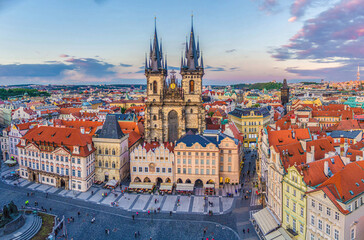 Fototapeta na wymiar Panorama of Prague Old Town historical centre Stare Mesto Old Town Square Staromestske namesti with Gothic Church of Our Lady before Tyn. Aerial panoramic view of Prague city, Czech Republic