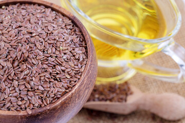Flax seeds and oil isolated on white background