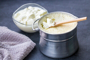 Turkish and Greek traditional dairy food yogurt or yoghurt in a pot (Goat yogurt)