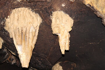 Crimea / Russia. red cave inside. Stalactites and stalagmites