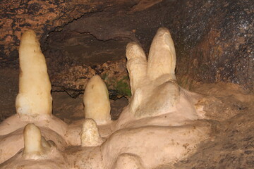 Crimea / Russia. red cave inside. Stalactites and stalagmites