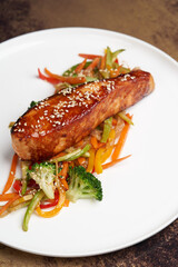 Teriyaki salmon on white plate. Salmon Teriyaki