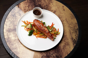 Teriyaki salmon on white plate. Salmon Teriyaki