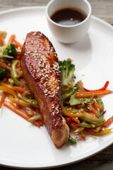 Teriyaki salmon on white plate. Salmon Teriyaki