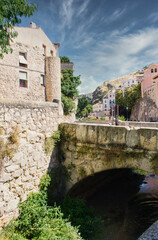 Fototapeta premium Stone bridge over the Huecar river as it passes through the city of Cuenca