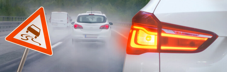 Warning sign. Risk of accidents in rain and fog on the motorway with braking cars and traffic sign...