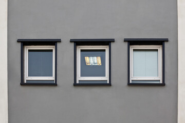 Obraz na płótnie Canvas 3 windows in gray view
