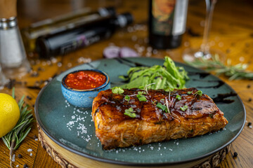 Grilled bbq pork ribs served with sauce