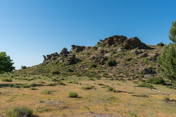 Fototapeta na wymiar Rocky area with vegetation in Sierra Nevada