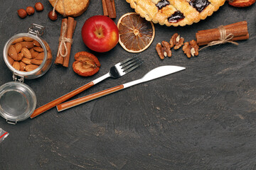 Apple tart pie on black surface close up
