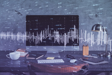 Financial graph colorful drawing and table with computer on background. Multi exposure. Concept of...
