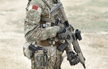 Soldier with assault rifle and flag of China on military uniform. Collage.