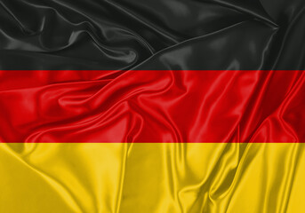 Germany flag waving in the wind. National flag on satin cloth surface texture. Background for international concept.