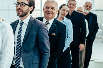close up. a group of company specialists standing in a row