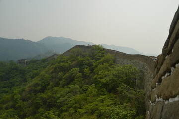 Hiking in the beautiful Chinese mountain landscapes and on the ancient historical Great Wall of China 