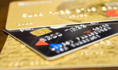 Close-up of a three credit cards located on a table  - 390101787