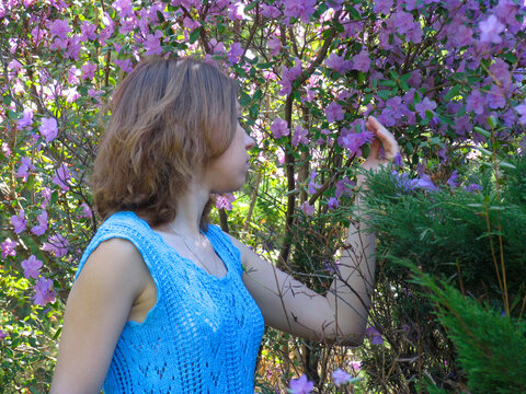 Girl and rhododendron
