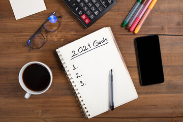 New Year's Solution Goal List 2021. Handwritten notebook about New Year's goals and resolutions plan list.