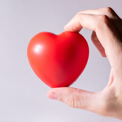 Obraz premium close up. small heart in a human hand .