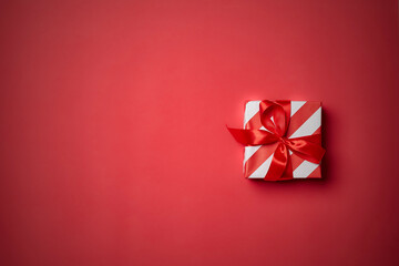 Christmas gift box, Christmas ball Ornaments on red background top flat layout blank copy space for text.