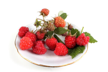 Raspberries on saucer